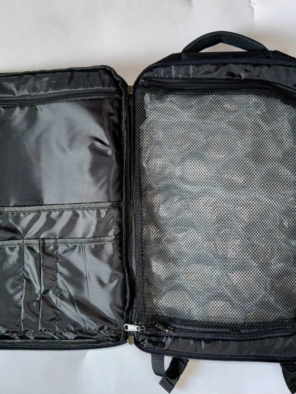 True Religion Will travel backpack in black with a volume of 23 l